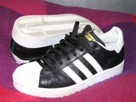 adidas with stripes only on one side|shoes with stripes on one side.